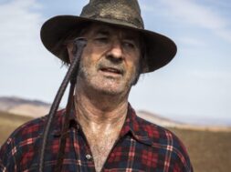 WolfCreek2_John-Jarratt-as-Mick-Taylor_portrait-3-e1726861405786.jpg